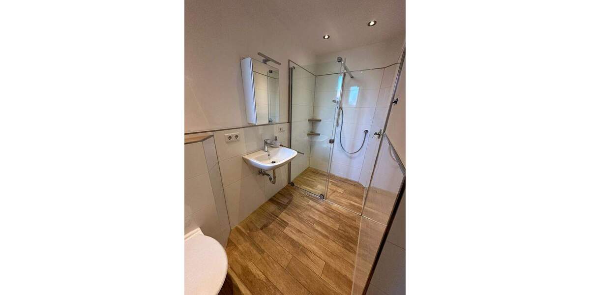 Sanierte 3,5-Zimmer-Erdgeschosswohnung mit Garten und Garage 3 zimmer