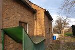 Grundstück 1200 qm mit älterem Wohnhaus und Nebengebäuden