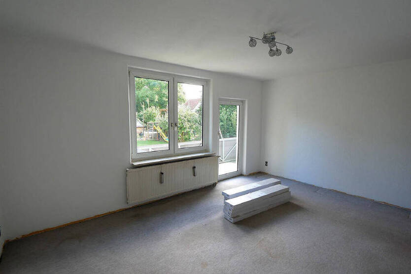 Ruhige Lage in Weidhausen: 3-Zimmer-Wohnung mit Balkon und Garage