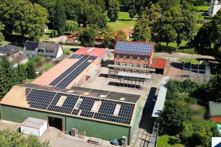 Investieren oder Mieten: Isolierte und beheizbare Gewerbefläche mit Freilager und Parkplätzen zimmer