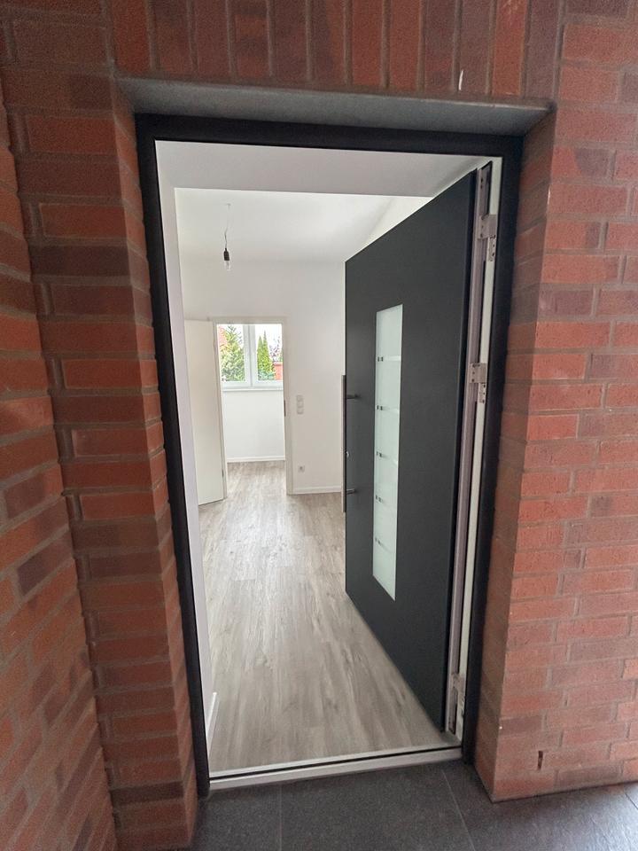 Doppelhaushälfte mit Garten und überdachter Terrasse (Erstbezug) zimmer