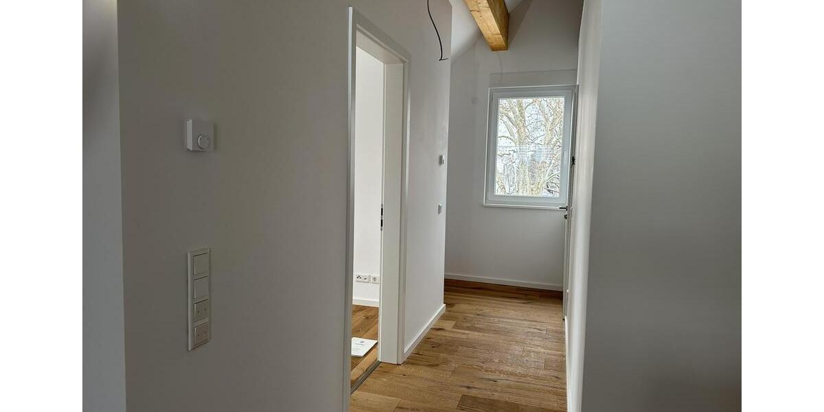 Erstbezug! Exklusives Wohnen im DG: 3-Zimmer, 5m Deckenhöhe, KfW 40, Klimaanlage, EBK & Südbalkon 3 zimmer