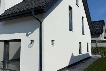 Neubau Doppelhaushälfte A+ mit Keller und Garten in Brockhagen zimmer