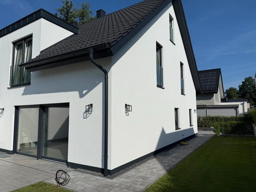 Neubau Doppelhaushälfte A+ mit Keller und Garten in Brockhagen zimmer