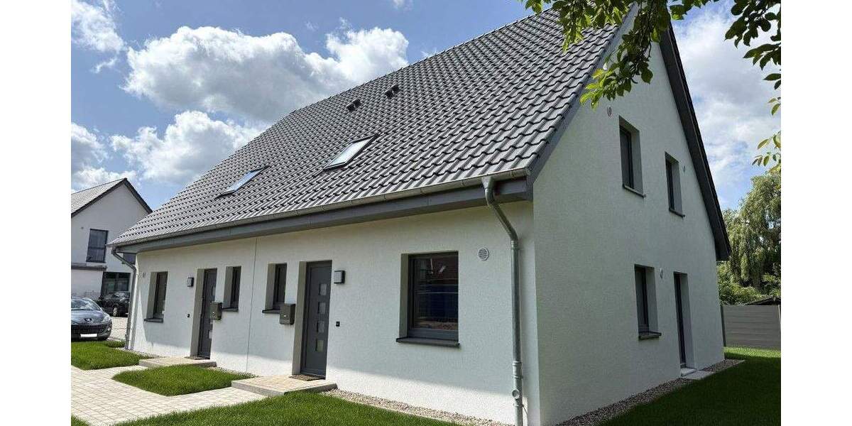 ...Neubau Erstbezug! Attraktive DHH in KfW 55 Standard mit Süd- West Terrassen und Stellplätzen 4 zimmer