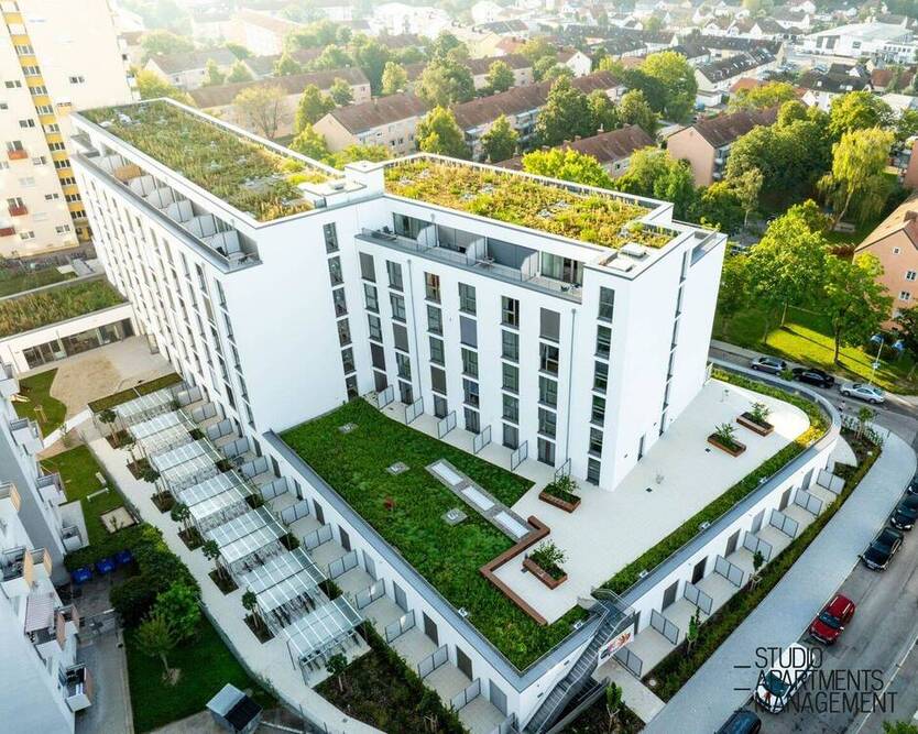 DONAU SIDE: Modernes Studio Apartment mit Terrasse, Fitnessstudio & Co-Working