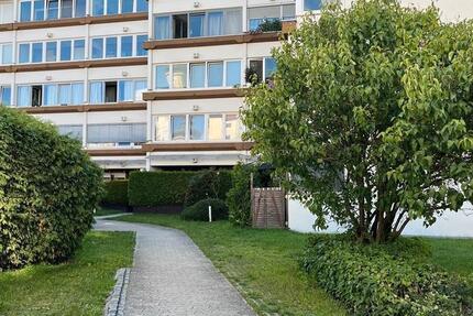 Moderne Erdgeschoßwohnung mit Terrasse, Gartenanteil & TG-Stellplatz