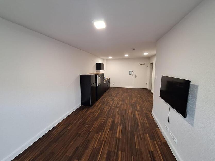 Exklusive 2 Zimmer Neubauwohnung mit Stellplatz und Einbauküche zimmer