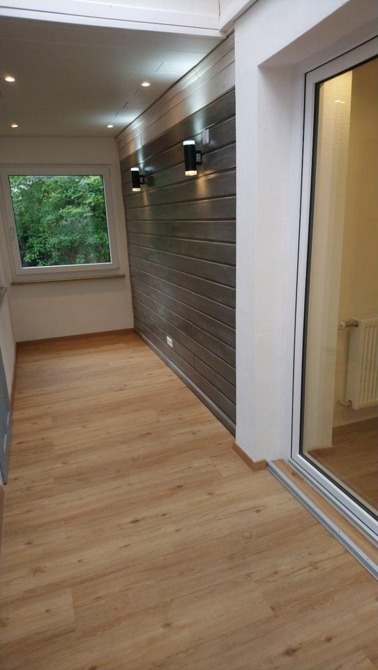 Helle und charmante 2-Zimmer-Wohnung mit einer großen Veranda