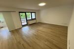 Kernsanierte 2,5-Zi-Wohnung mit EBK, Balkon und Garage