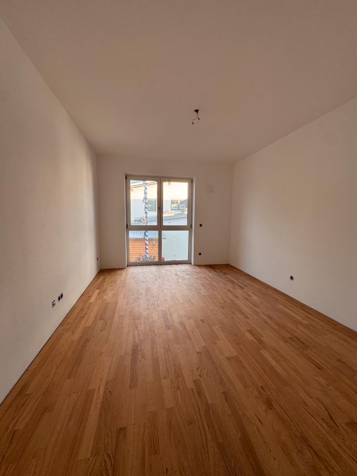 Erstbezug mit Balkon: Schöne, helle 4-Zimmer-Wohnung