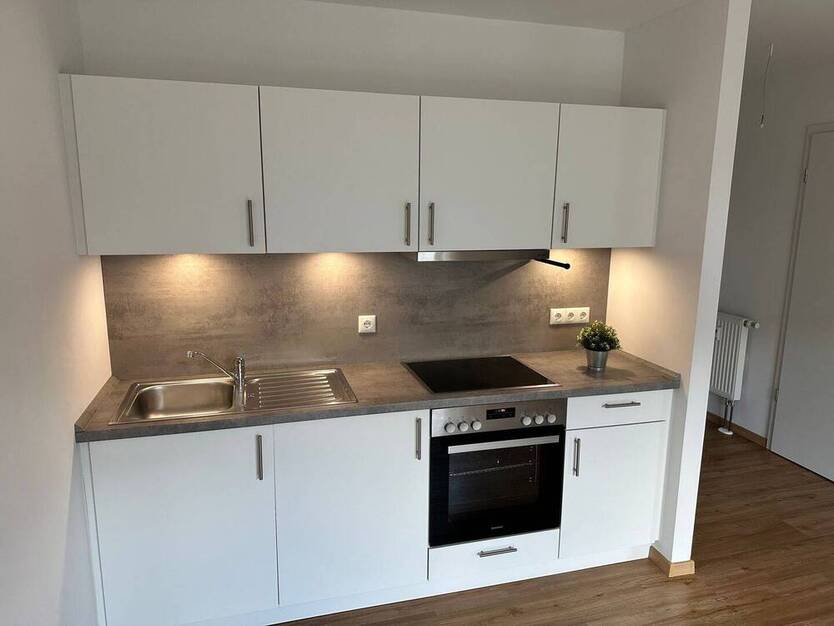 Moderne 1 Zimmer Wohnung KFW 55 mit Balkon, Einbauküche uvm.