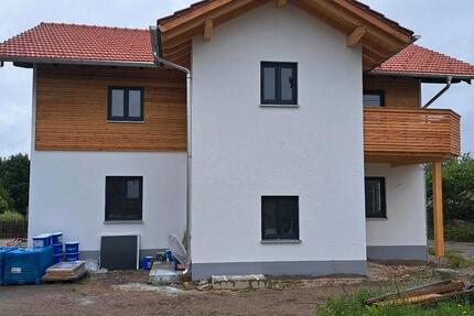 Neuwertige 3-Zimmer-Wohnung mit großem Balkon und Gartenanteil