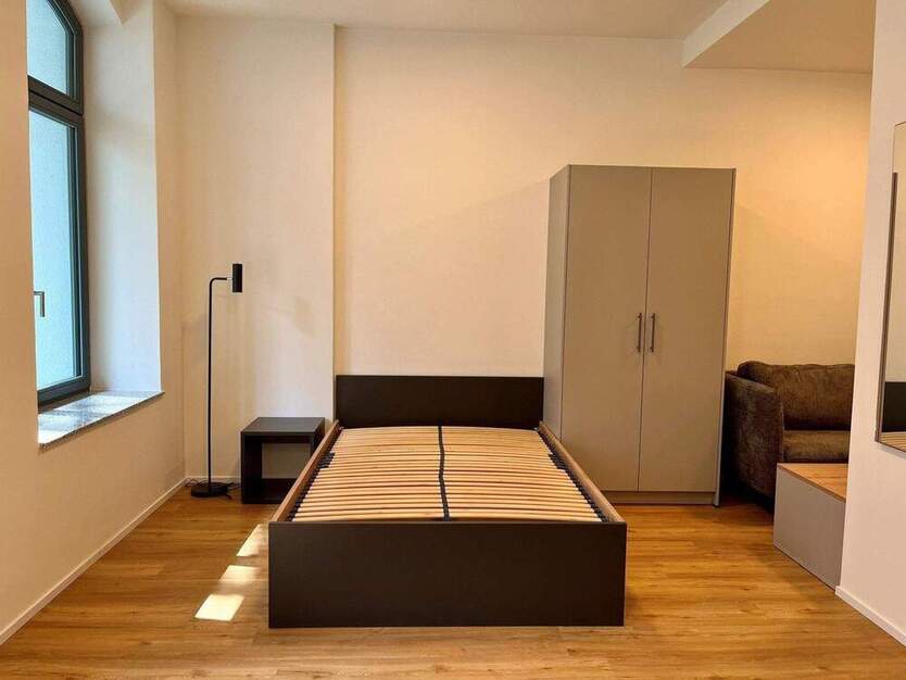 Loftige, möblierte 1-Zimmer-Wohnung mit großer Terrasse zum Erstbezug!