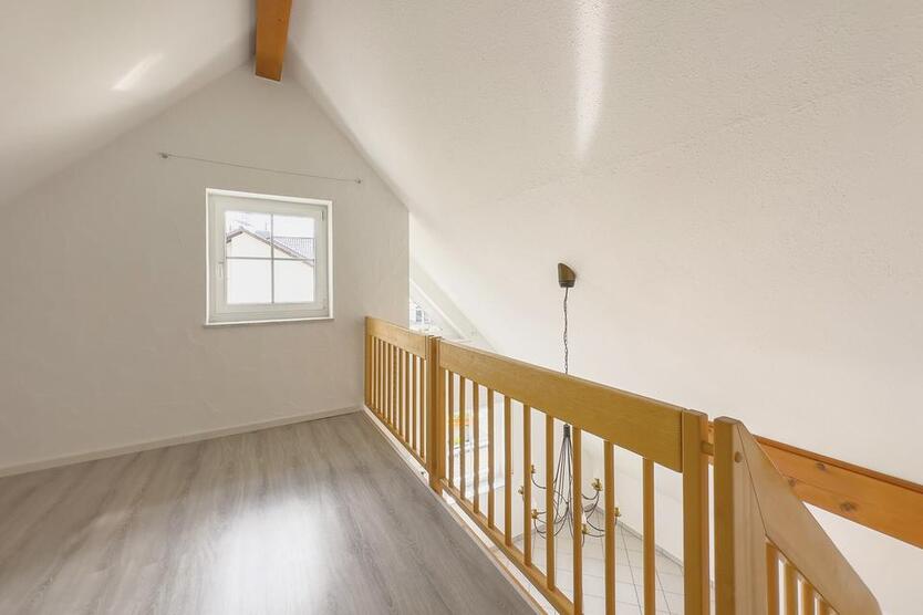 Lichtdurchflutete Maisonette-Wohnung mit gemütlichem Wohnflair