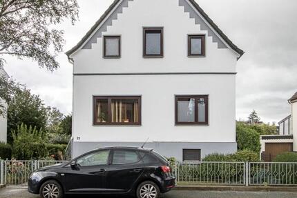 Hochparterre-Wohnung mit Gartenanteil