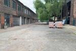 WerkstattLager (kein Tor) + Terrasse + Stellplatz im 