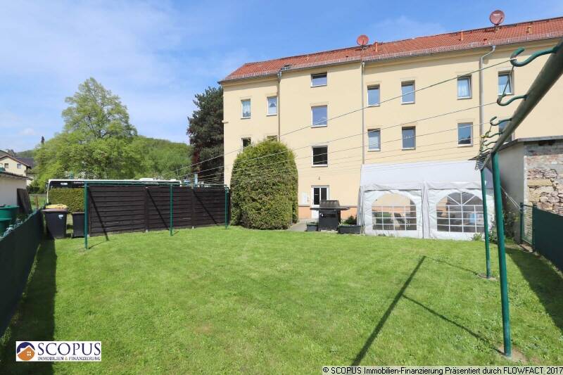 Helle Single-Wohnung mit Einbauküche, Gartenmitbenutzung, PKW-Stellplatz