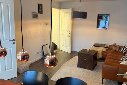 Neuwertige 3-Zimmer-Wohnung mit Balkon und Gartenanteil