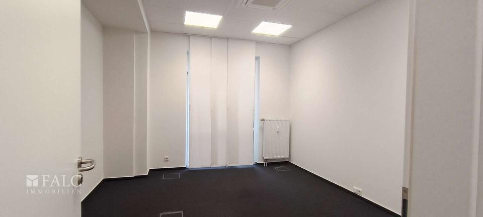 Raum für Visionen – stilvolle Gewerbeimmobilie mit Glasfront und Charakter zimmer