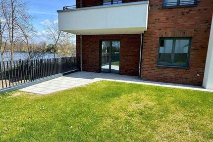 Traumhafte 3-Zi-Neubauwohnung mit Garten direkt am Wasser (Erstbezug)! 3 zimmer