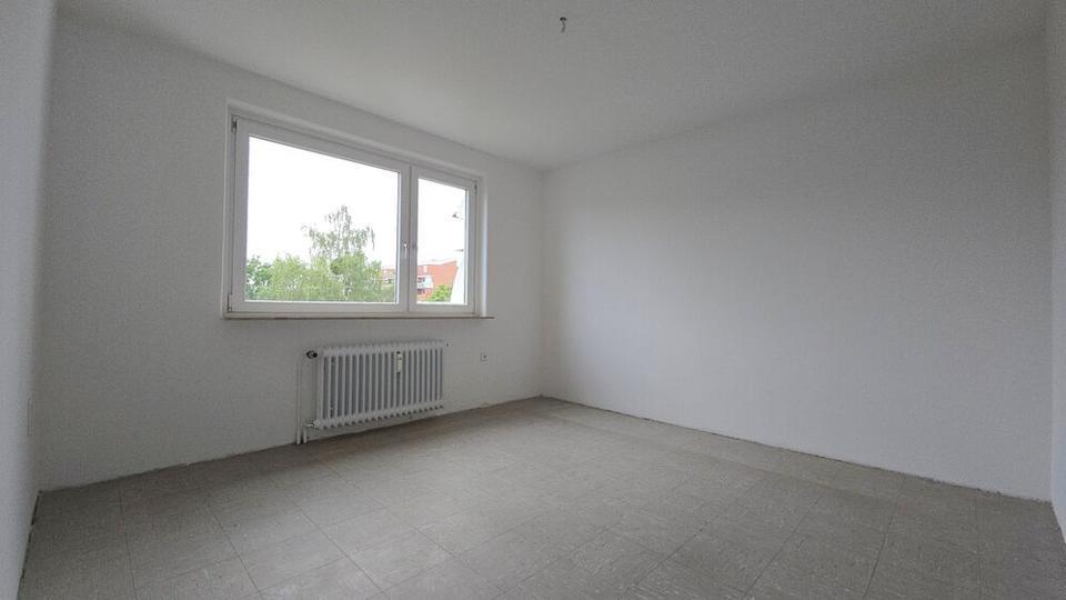 Familienfreundliche Wohnung mit Aufzug im Haus zimmer