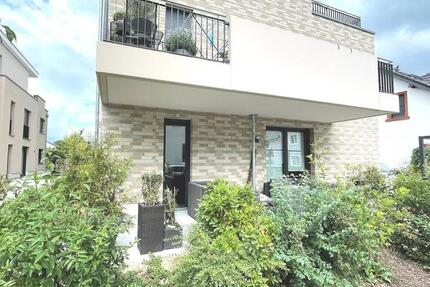 Moderne 2,5-Zimmer-Erdgeschosswohnung mit großer Südterrasse, EBK und TG-Platz in Mainz-Finthen zimmer
