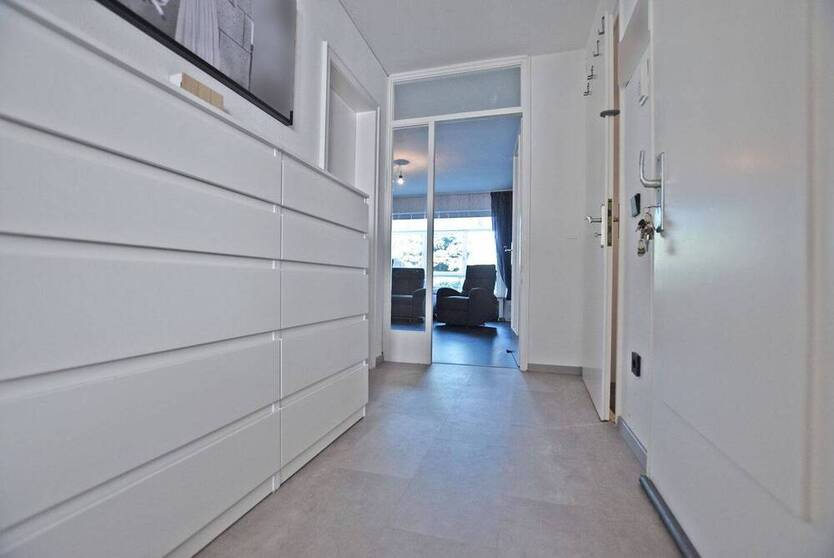 Helle 3,5-Zimmer-Wohnung mit großem Wintergarten und Privatgarten in ruhiger Lage