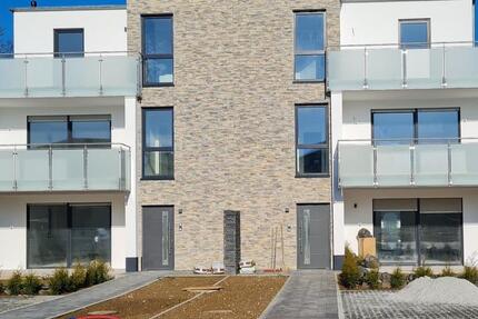 Erstbezug mit Balkon:Geschmackvolle 4-Raum-Wohnung in Ober-Mörlen zimmer