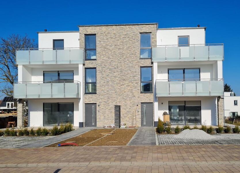 Erstbezug mit Balkon:Geschmackvolle 4-Raum-Wohnung in Ober-Mörlen zimmer