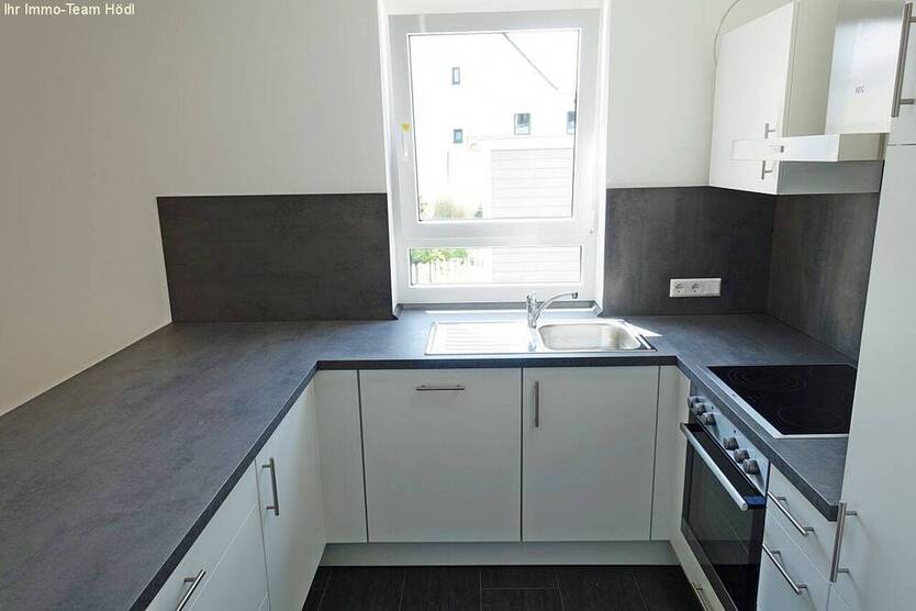 Neuwertige Erdgeschoßwohnung mit großer Terrasse