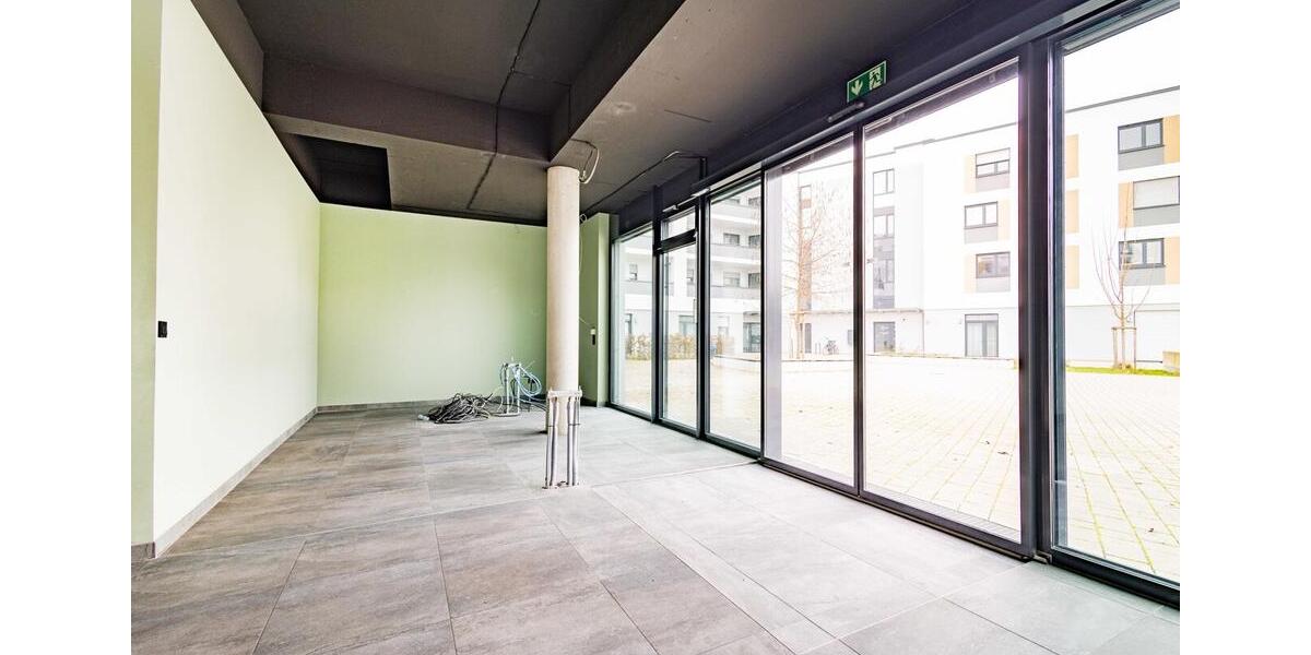 BRUMANI | Moderne Gewerbefläche im Neubau mit großer Schaufensterfront in Freiburg-Haslach zimmer