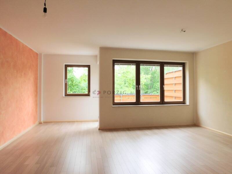 Wohnluxus mit Weitblick - Dachterrasse, Maisonette-Charme & Garage inklusive!