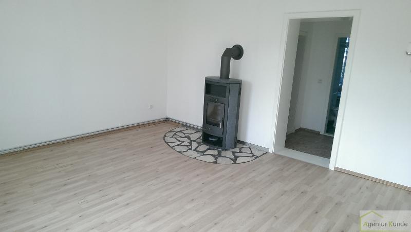 3 Zimmer mit Kamin und Gartennutzung im netten 4 Familienhaus