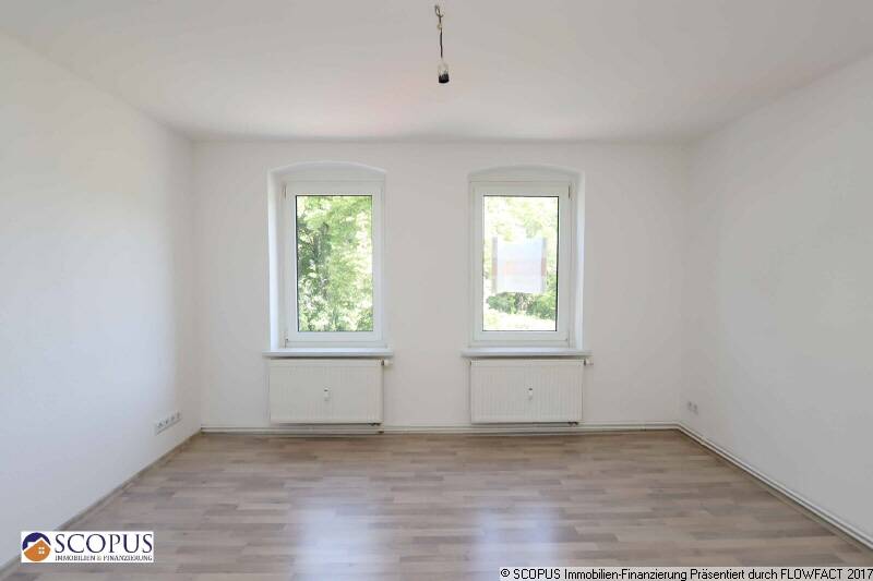 Helle Single-Wohnung mit Einbauküche, Gartenmitbenutzung, PKW-Stellplatz