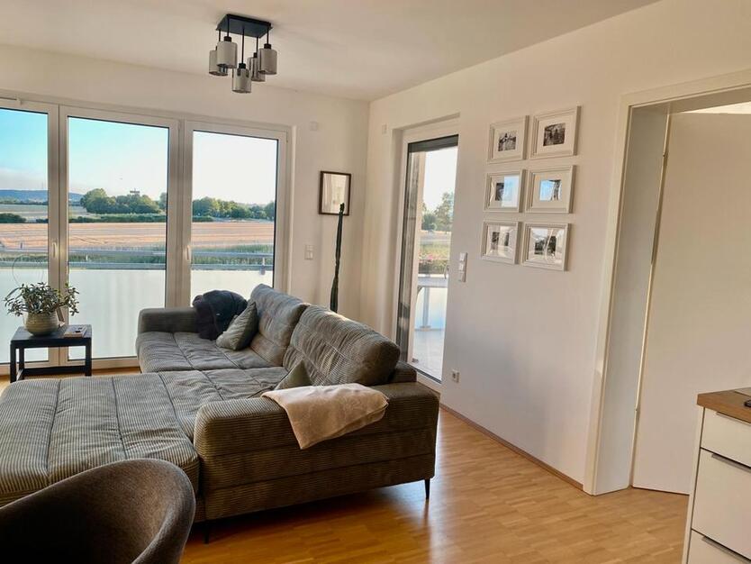 Helle Wohnung BJ 202223 mit Westbalkon, TG-Stellplatz und Stellplatz im Freien!
