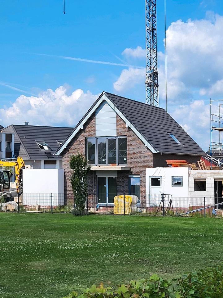 NeubauWohnung in Kalkar, KfW 40-QNG, 1.OG, Balkon, Garage, EBK