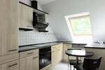 Wohnluxus mit Weitblick - Dachterrasse, Maisonette-Charme & Garage inklusive!