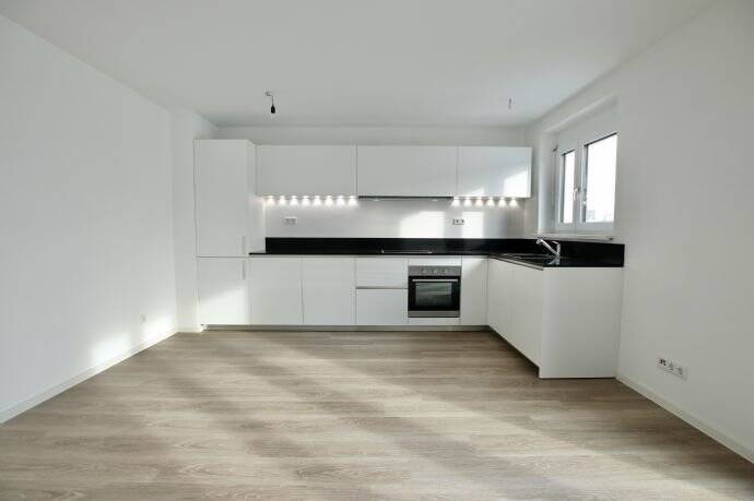 Moderne 3.5-ZWG mit Dachterrasse & Einbauküche im Riedpark