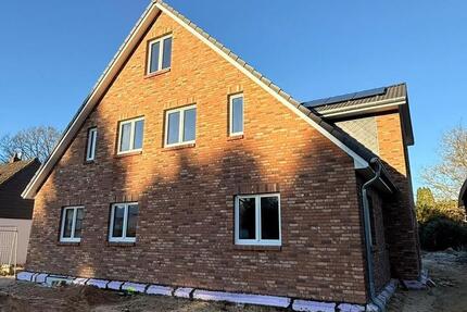 Wohnung mit Haus-Charakter: Energie Effizienter Neubau mit Garten 5 zimmer