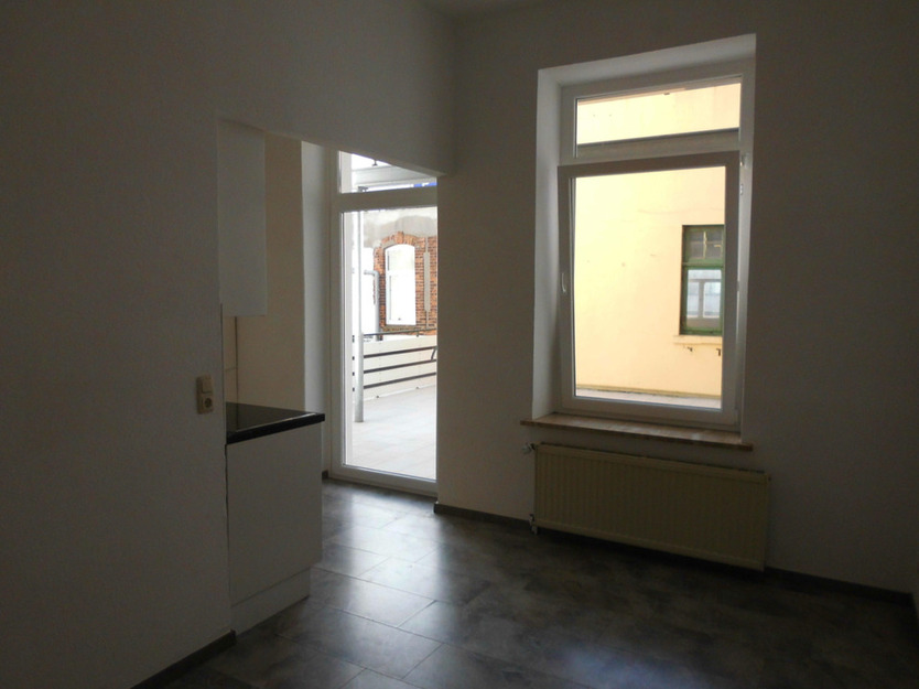 Zentrale 3-Zimmer-Wohnung mit EBK und Dachterrasse