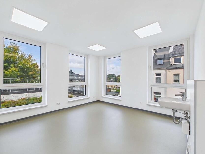 Praxis- und Gewerbeeinheit in Zentrumsnähe - Erstbezug, energieeffizient und barrierefrei zimmer