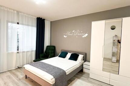 Modernes City-Apartment mit atemberaubender Skyline & Parkblick zimmer