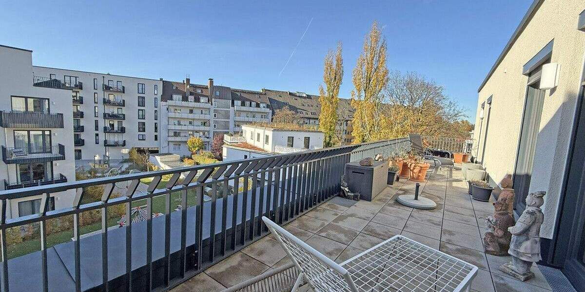 Helle 4-Zimmer-Wohnung mit 32 m² Dachterrasse, hochwertiger Ausstattung & Tiefgarage 4 zimmer