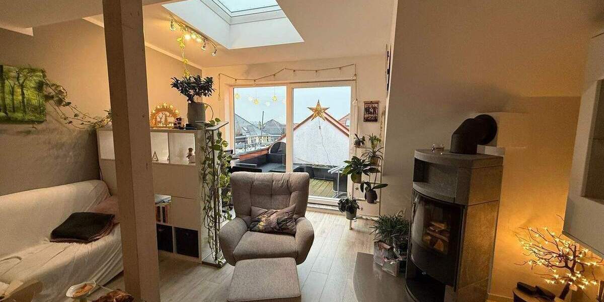 Traumhafte DG-Wohnung mit Kamin und 2 Dachterrassen 5 zimmer