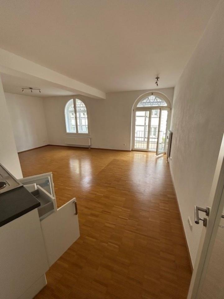 Hochwertige zentrale NeubauWohnung mit historischem Charme