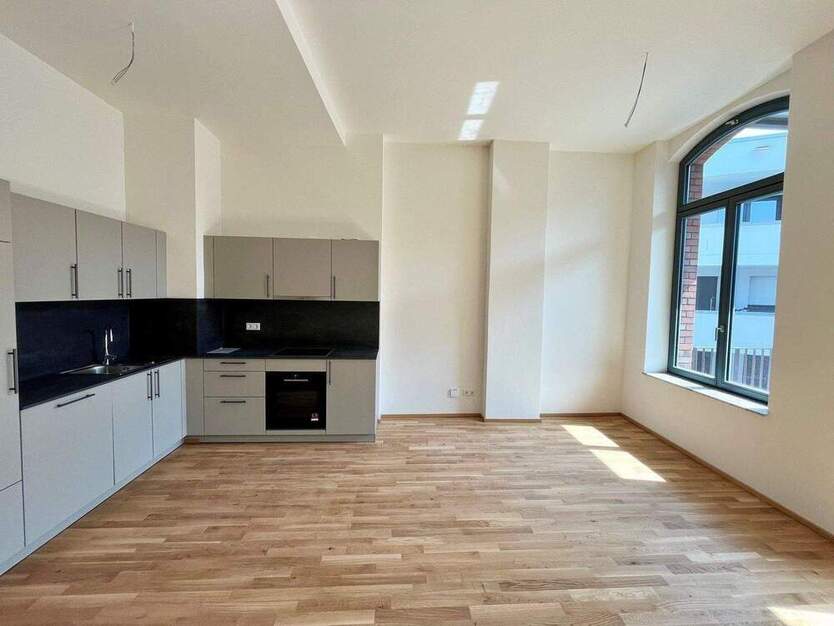 Sie suchen das Besondere? 2-Zimmer-LoftWohnung mit Balkon zum Erstbezug!