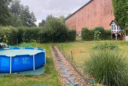 Wohnung mit Garten und Küche