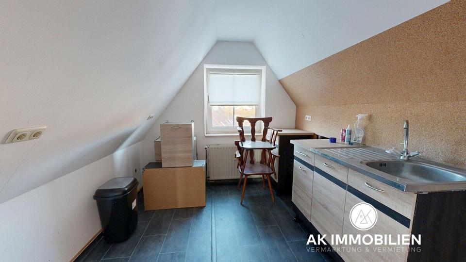 Reserviert - Dachgeschosswohnung mit Balkon in zentraler Innenstadtlage von Hessisch Oldendorf 2 zimmer