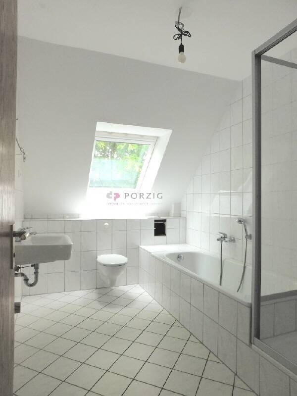 Wohnluxus mit Weitblick - Dachterrasse, Maisonette-Charme & Garage inklusive!